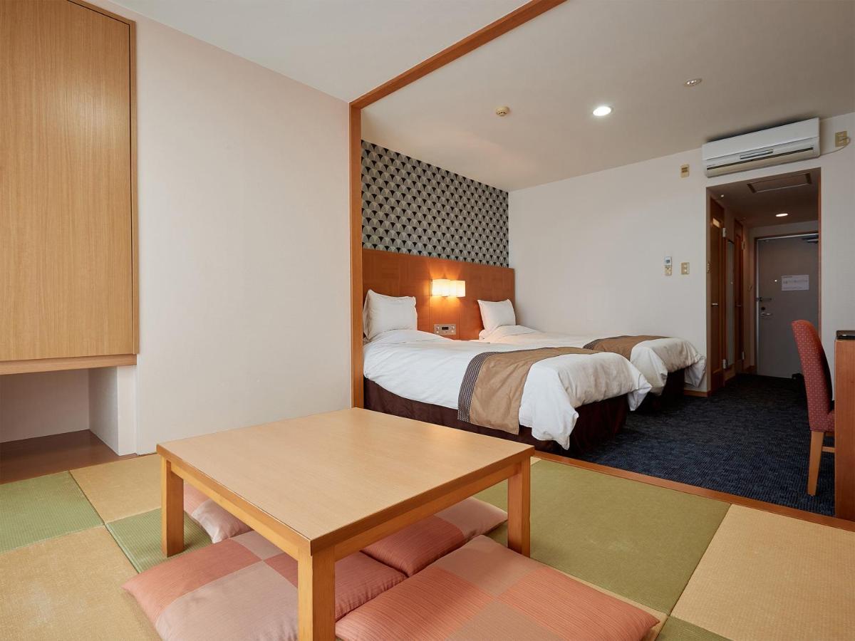 Hotel Murasakimura Yomitan Exteriér fotografie