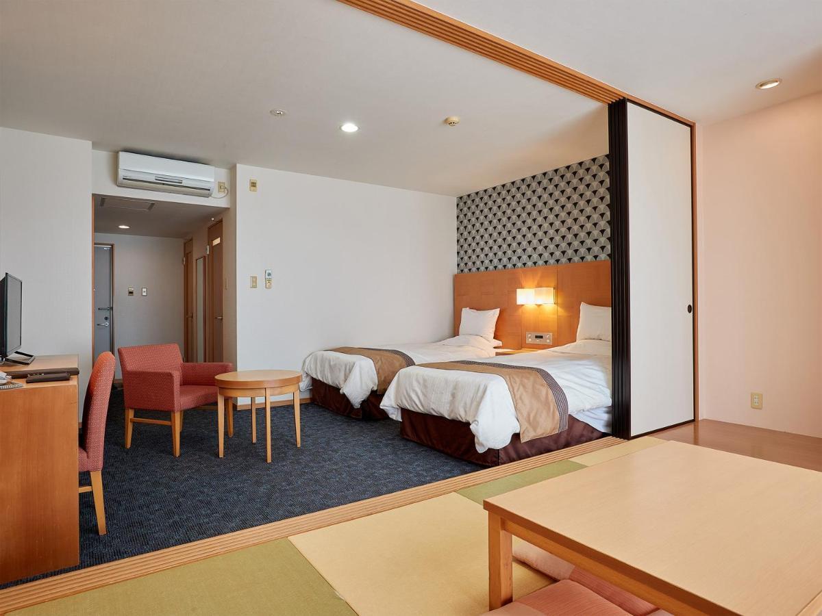 Hotel Murasakimura Yomitan Exteriér fotografie